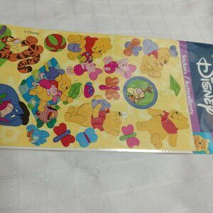 3 pages of vintage stickers in various sizes with Winnie the Pooh designs